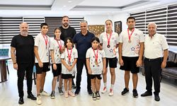 Şampiyonlardan Başkan Uysal'a ziyaret