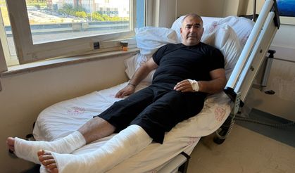 Alevler içindeki kamyonu insanlara zarar vermesin diye bariyerlere sürdü