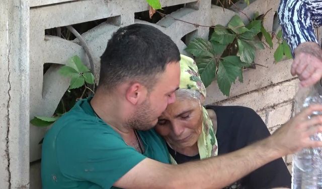 Evlerinin yandığını gören anne-oğulun gözyaşları sel oldu