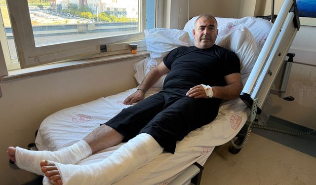 Alevler içindeki kamyonu insanlara zarar vermesin diye bariyerlere sürdü